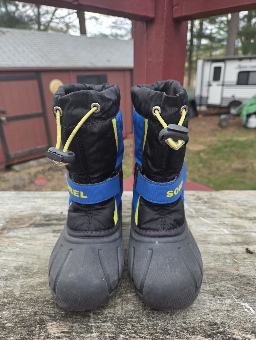 Sorel Kids Blue and Black Waterproof Snow Boots with Yellow Accents